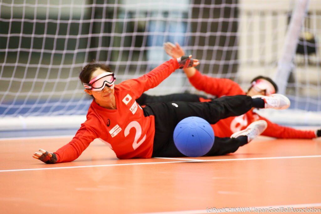 Rie Urata of Japan stretches to make a save