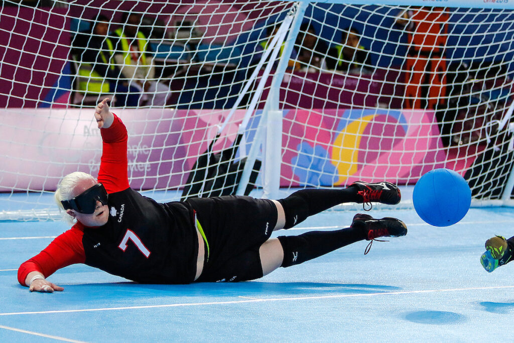 Amy Burk of Canada gets in the way of a goalball whilst lying down at the Lima 2019 Parapan American Games