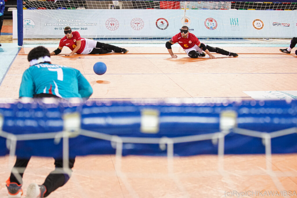 The Turkish goal is pictured from behind as the Montenegro defence prepare to make a save