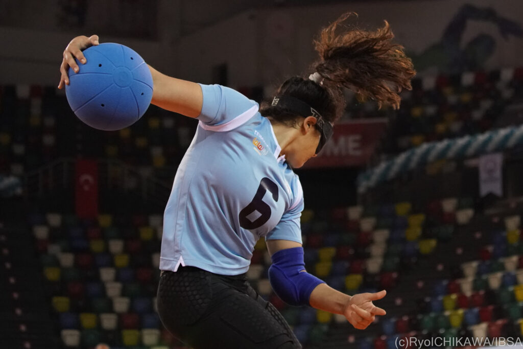 Lihi Ben David of Israel rotates during a throw, her hair flying in the air